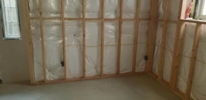 Basement electrical wiring and outlet installation in a Holbrook home