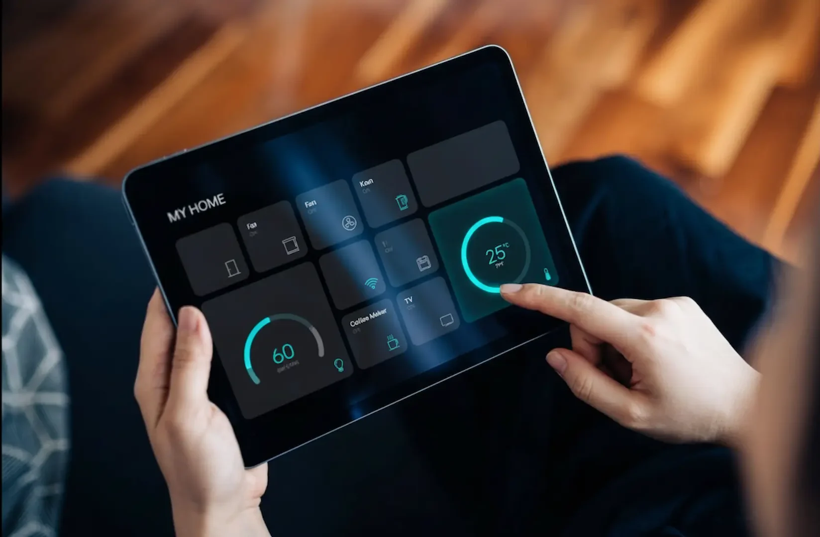 Energy-efficient Lighting: A person holding a tablet displaying a "MY HOME" smart automation interface with controls for temperature, lighting, and appliances.